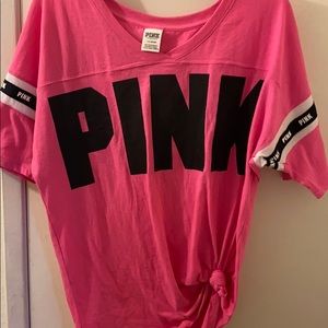 Brand new. Never worn pink shirt